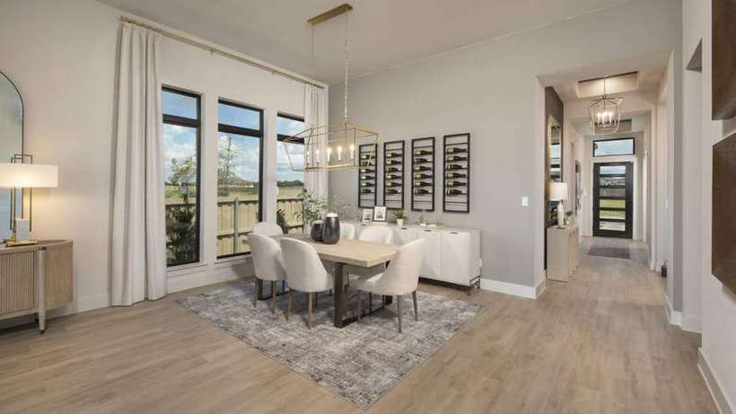 The Colony 60' · Soaring Two-Story Living & Architectural Windows